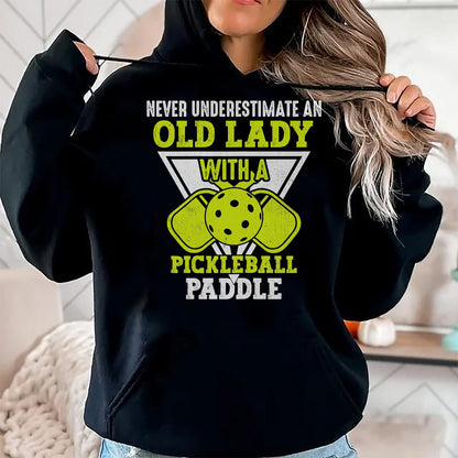 Funny Pickleball Shirt, Pickleball Lover Unisex T-Shirt/Hoodie/Sweatshirt HLT00 - Never underestimate an old lady with a pickleball paddle T-Shirt