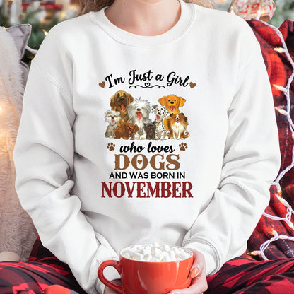 NOVEMBER - I'M JUST A GIRL WHO LOVES DOGS AND WAS BORN IN NOVEMBER - T-SHIRT FOR WOMEN - DTSM11 (SKU2609-329-11)