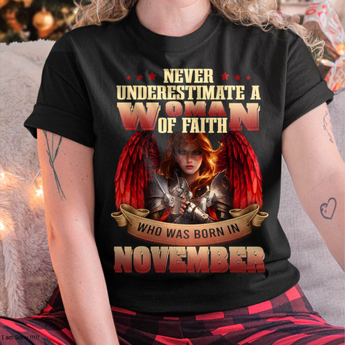 November - Never Underestimate a Woman of Faith - T Shirt For Woman - DTSM11 (SKU26T-01262-11)