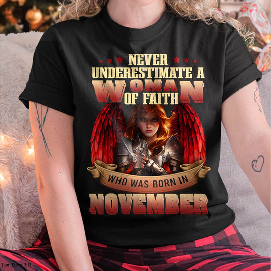 November - Never Underestimate a Woman of Faith - T Shirt For Woman - DTSM11 (SKU26T-01262-11)